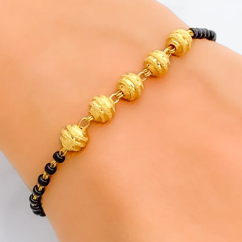 Lovely Multi-Orb 22k Gold Black Bead Bracelet