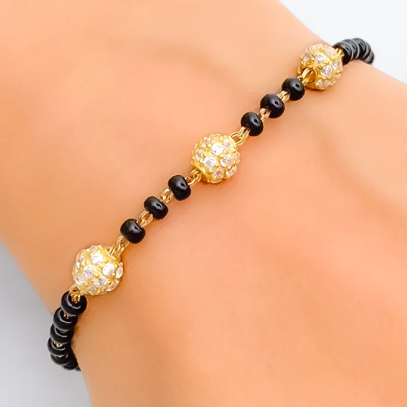 Elegant Orb 22k Gold Black Bead Bracelet