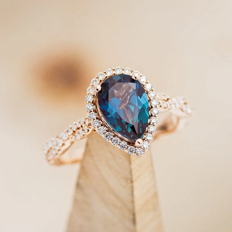 "KINLEY" - PEAR CUT LAB-GROWN ALEXANDRITE ENGAGEMENT RING WITH DIAMOND HALO & ACCENTS