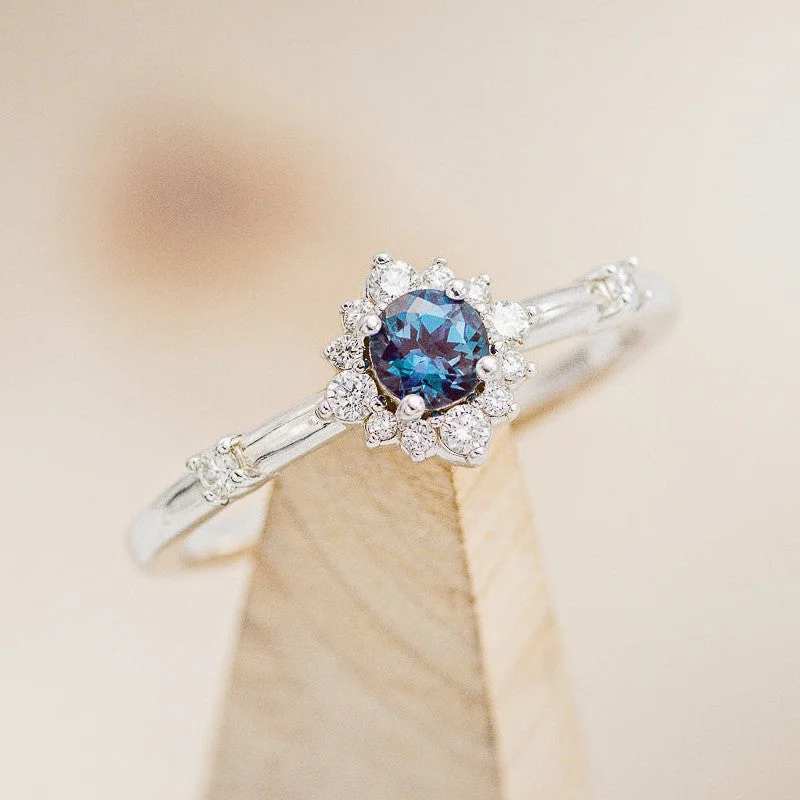 "STARLA" - ROUND CUT LAB-GROWN ALEXANDRITE ENGAGEMENT RING WITH STARBURST DIAMOND HALO