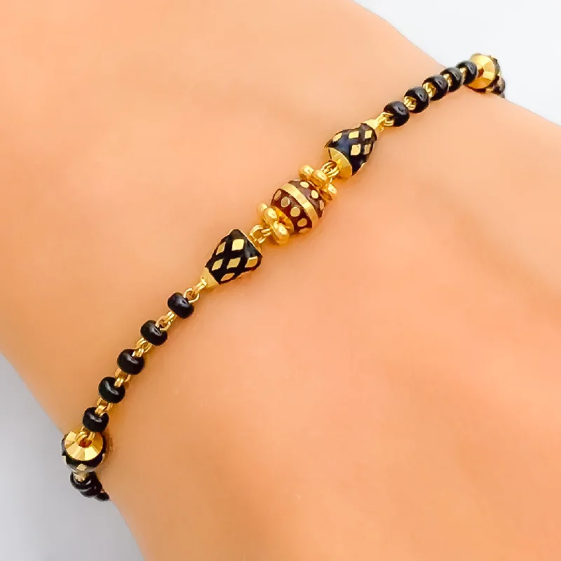 Luminous Lightweight 22k Gold Black Bead Bracelet