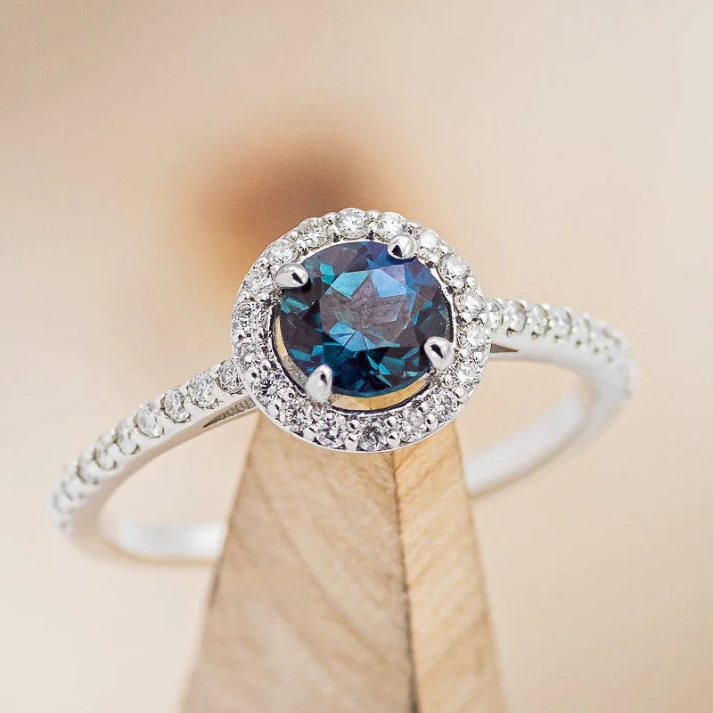 "AURORA" - ROUND CUT LAB-GROWN ALEXANDRITE ENGAGEMENT RING WITH DIAMOND HALO & ACCENTS