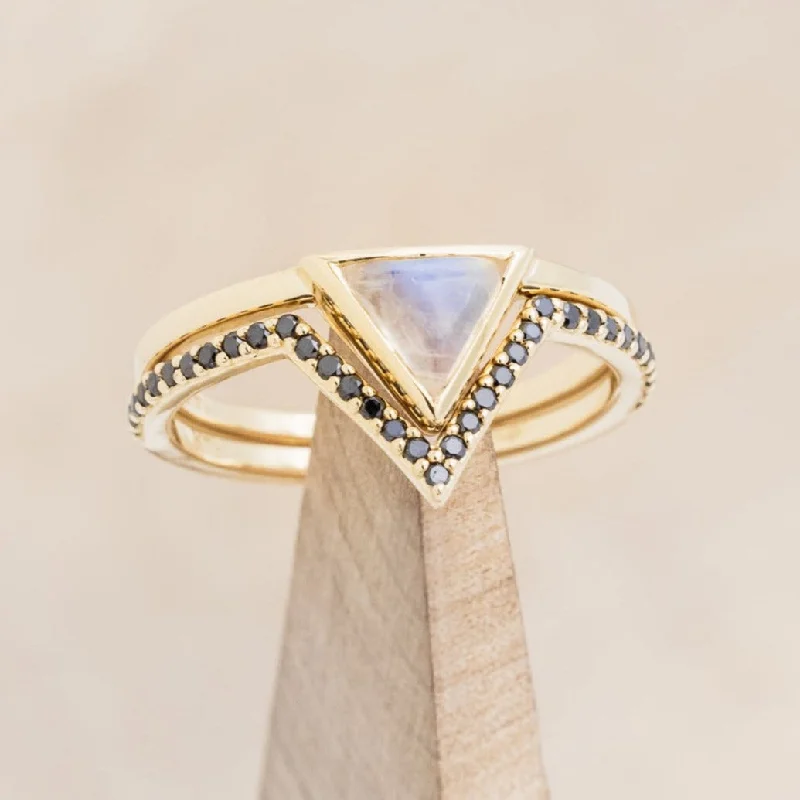 "JENNY FROM THE BLOCK" - TRIANGLE CABOCHON CUT MOONSTONE ENGAGEMENT RING WITH BLACK DIAMOND V-SHAPED TRACER