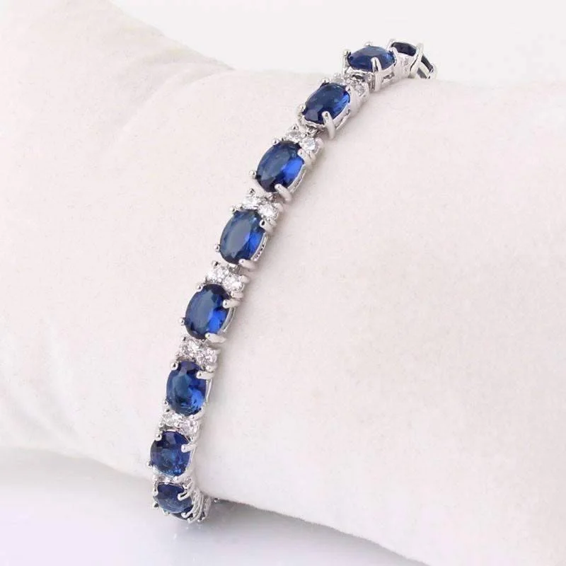 Sapphire Blue Oval Austrian Crystal Tennis Bracelet in 14K White Gold for Women